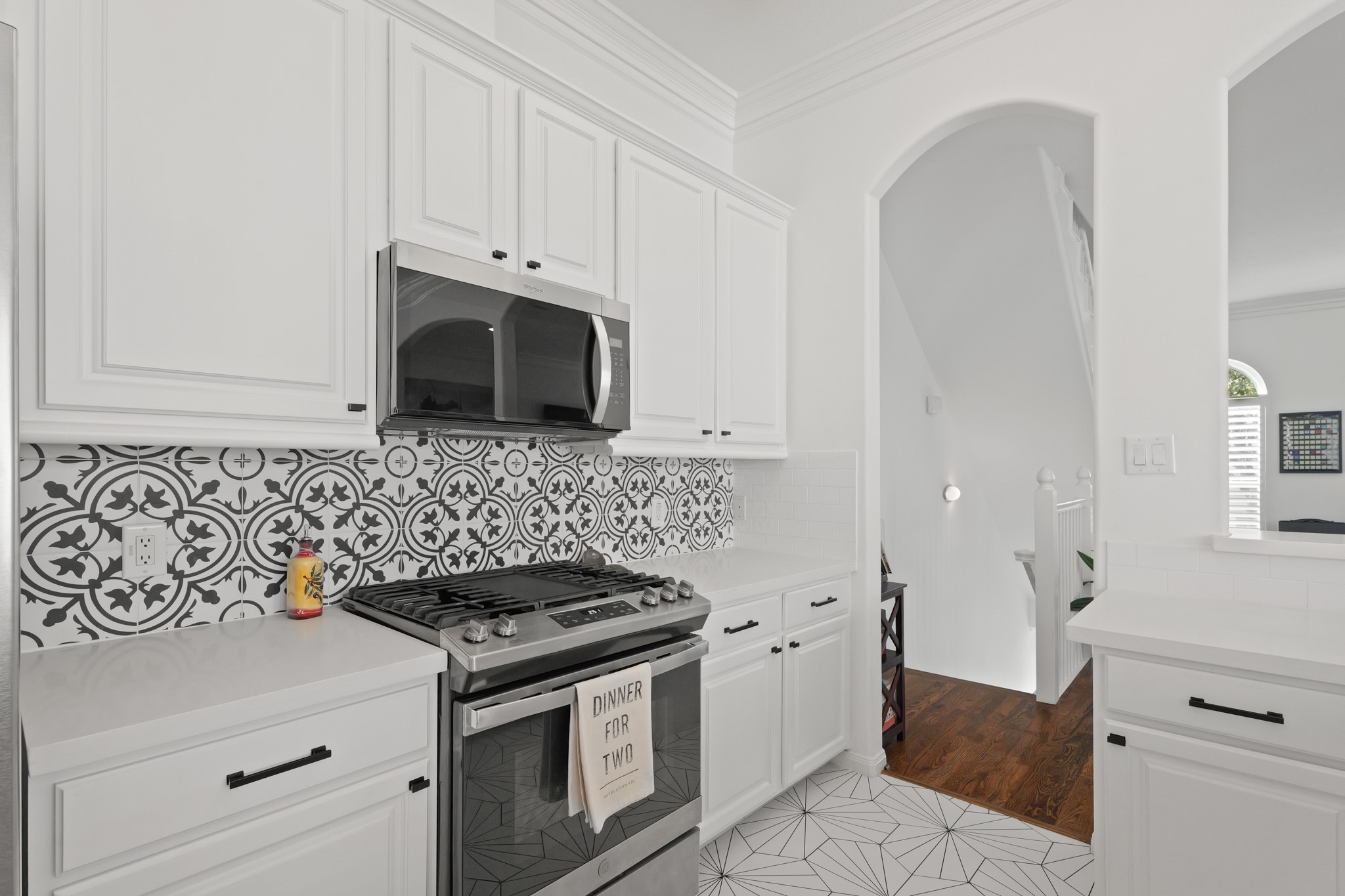 1330 Malone Street Houston, TX 77007 - Photo 7 of 23 Welcome to 1330 Malone! Designer backsplash and trendy appointments are the eye candy you will appreciate in this updated home.