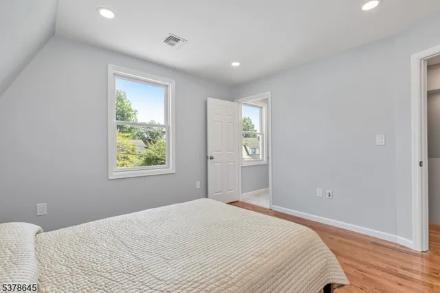 a bathroom with a bathtub and a sink
