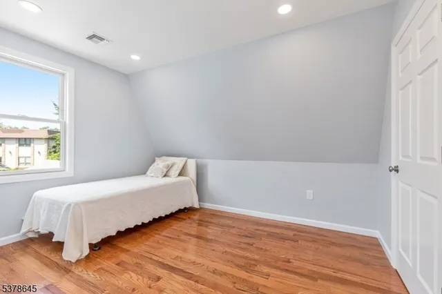 a bathroom with a sink vanity and a mirror