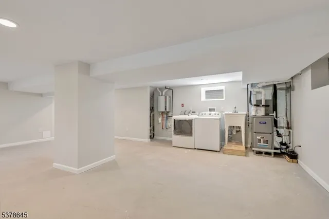 an empty room with a empty space and windows