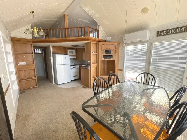 a view of a room with furniture