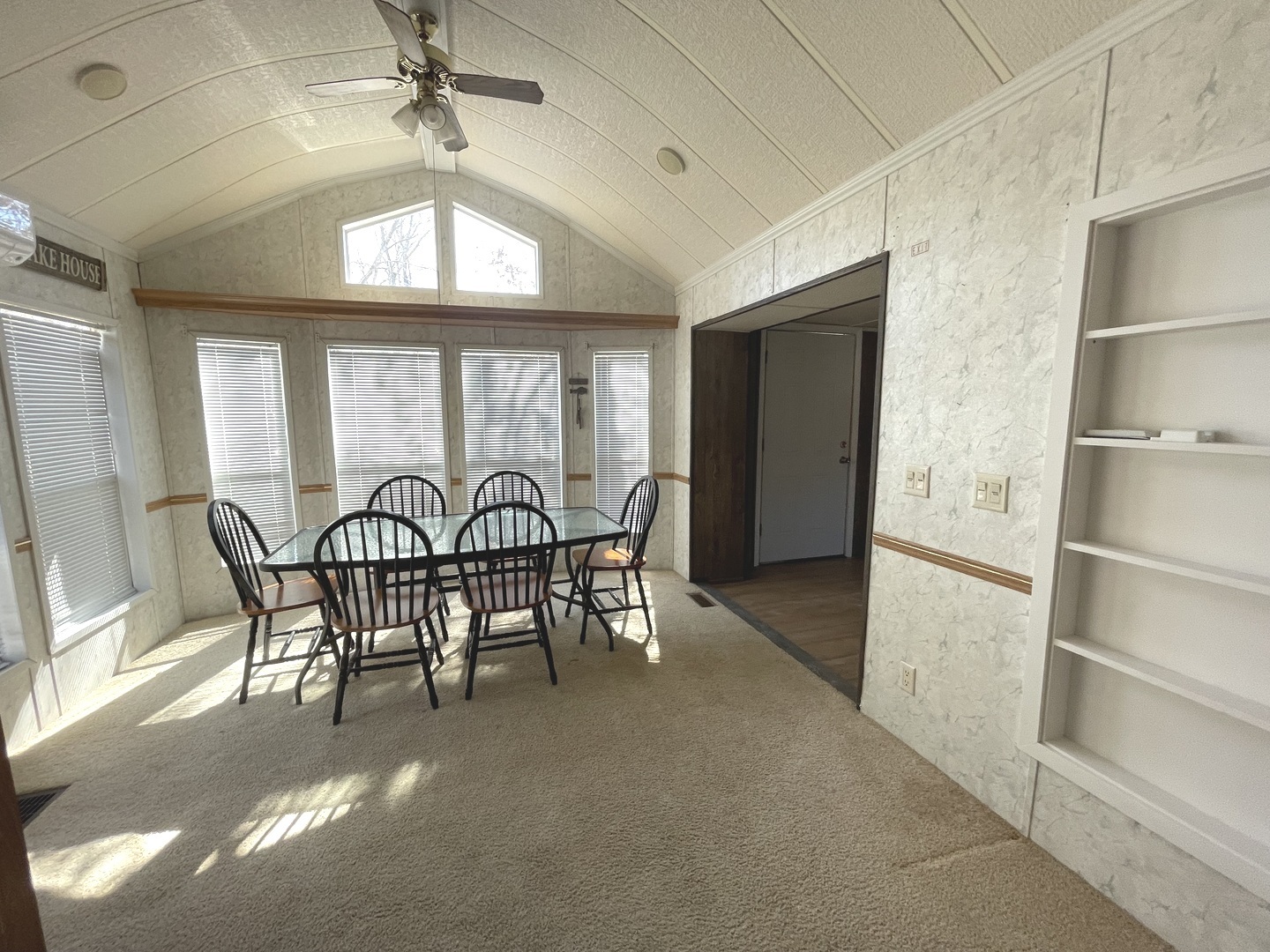 3-71 Woodhaven Lakes Sublette, IL 61367 - Photo 19 of 27 a dining room with furniture a chandelier and window