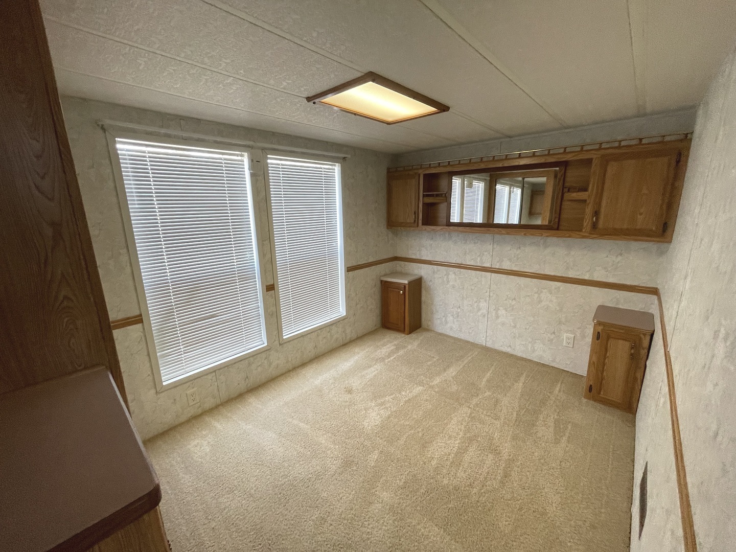 3-71 Woodhaven Lakes Sublette, IL 61367 - Photo 22 of 27 a view of a livingroom with an empty space and a window