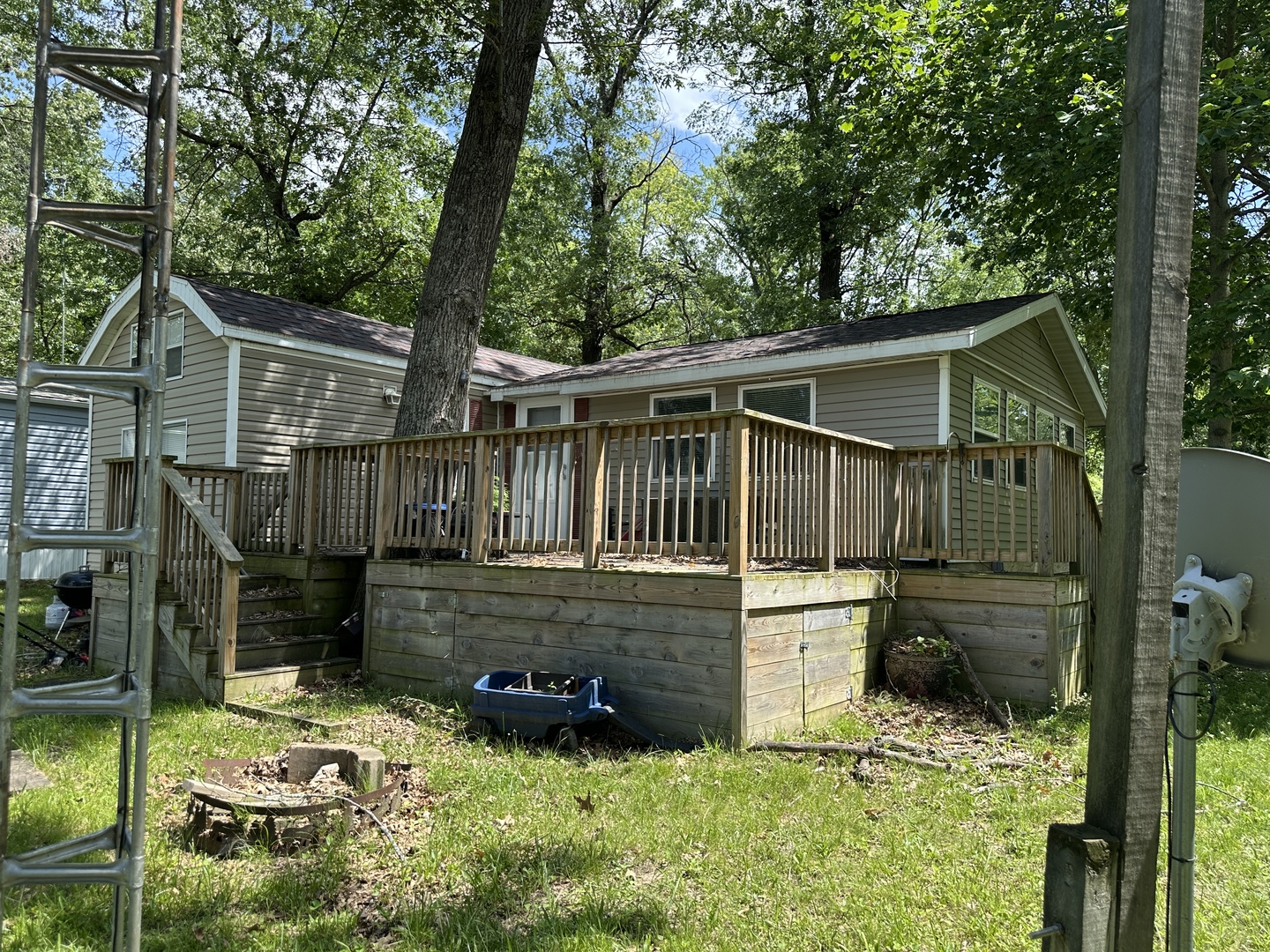 3-71 Woodhaven Lakes Sublette, IL 61367 - Photo 6 of 27 a view of house with backyard