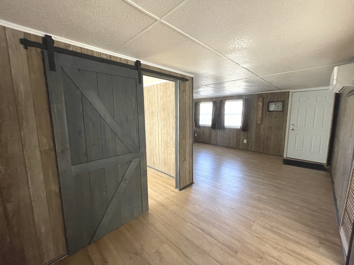 3-71 Woodhaven Lakes Sublette, IL 61367 - Photo 8 of 27 a view of hallway with stairs and wooden floor