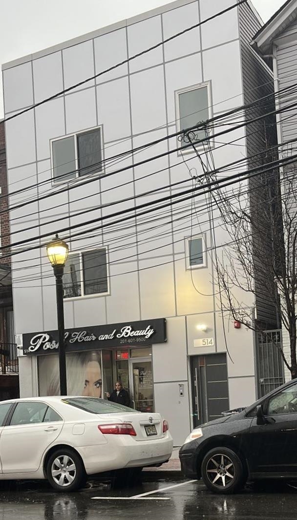 514 43rd Street, Unit 2 Union City, NJ 07087 - Photo 11 of 14 a front view of a building with parking