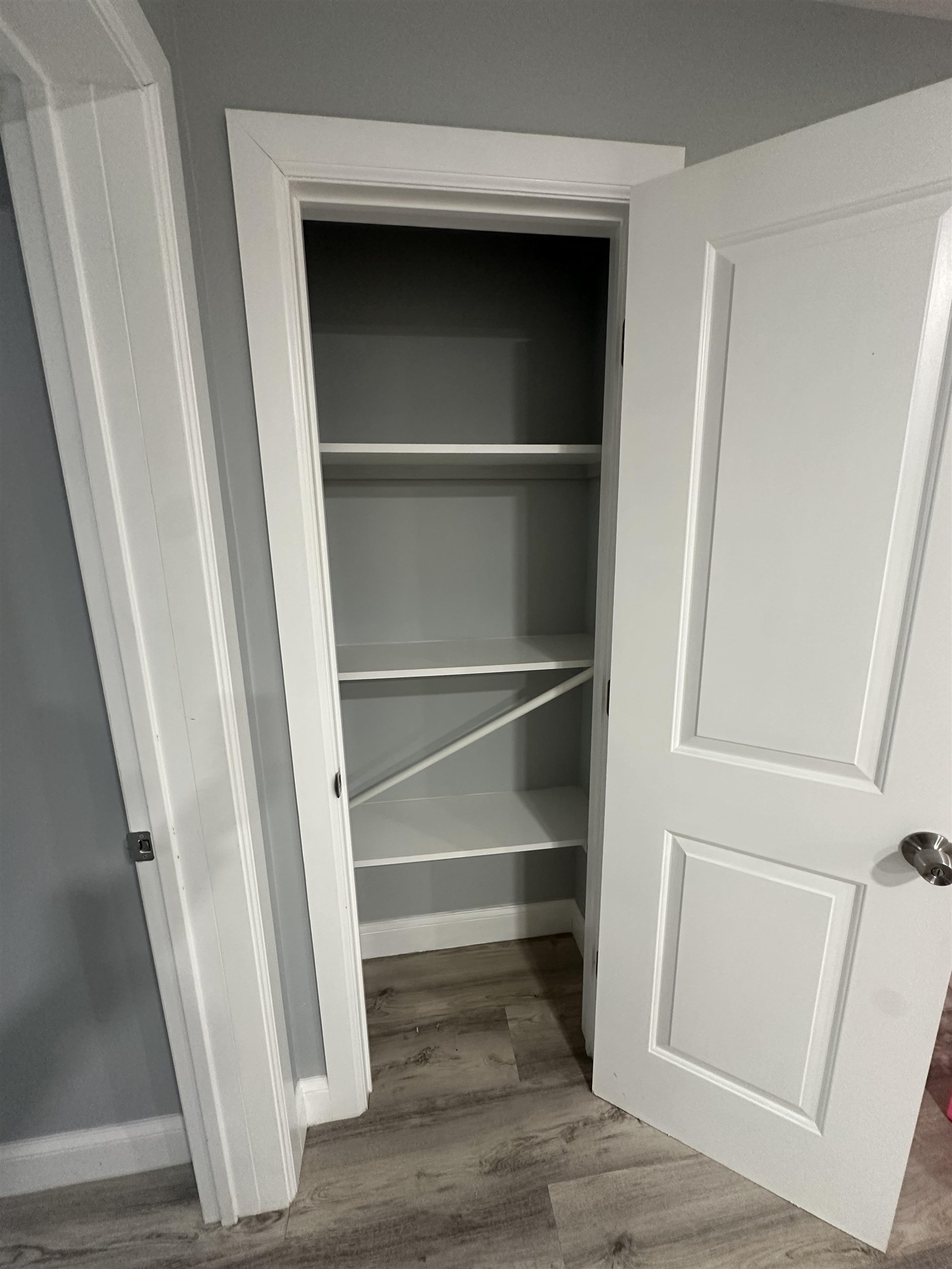 514 43rd Street, Unit 2 Union City, NJ 07087 - Photo 13 of 14 a view of closet with wooden floor