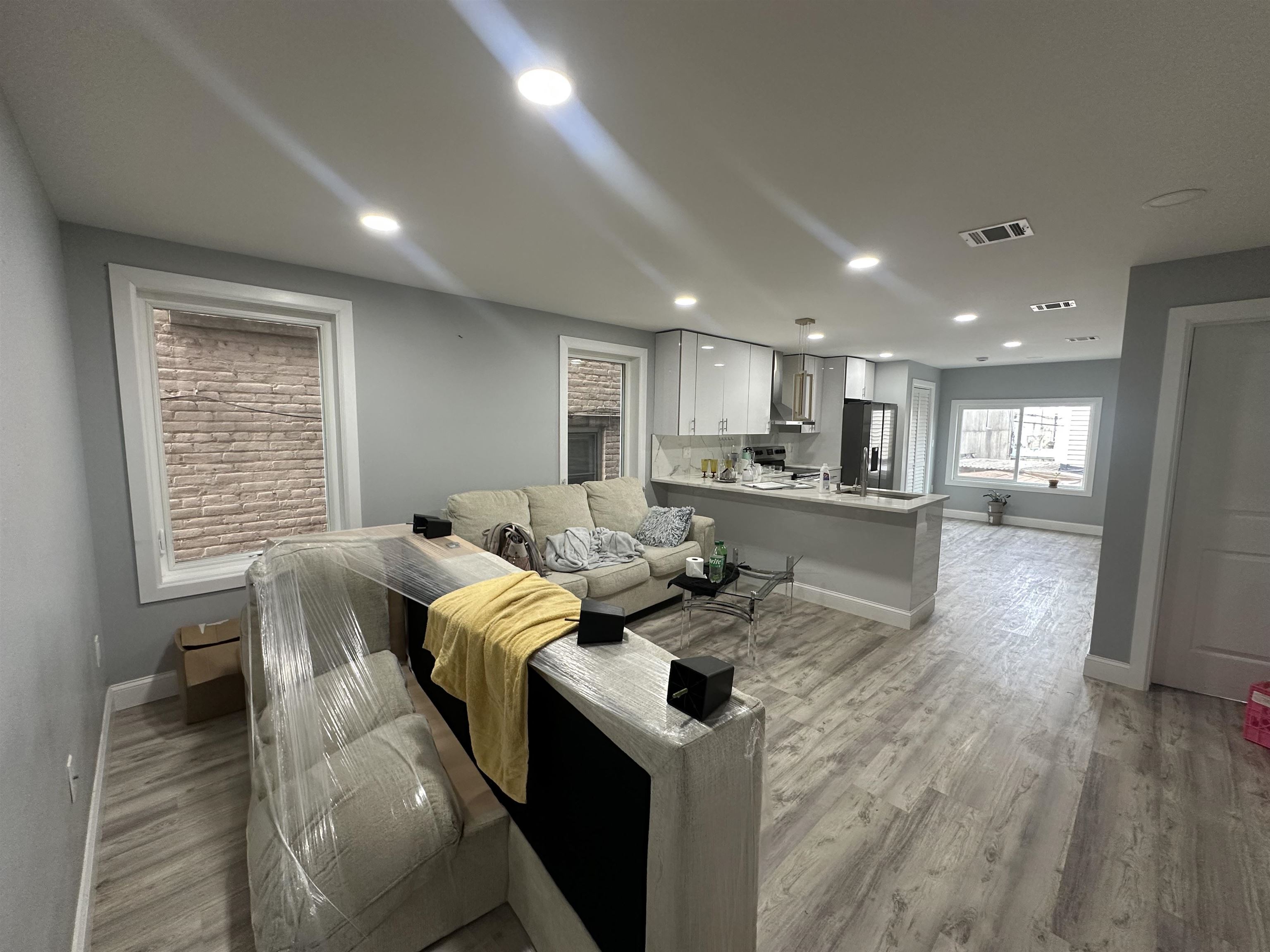 514 43rd Street, Unit 2 Union City, NJ 07087 - Photo 7 of 14 a living room with furniture and a wooden floor