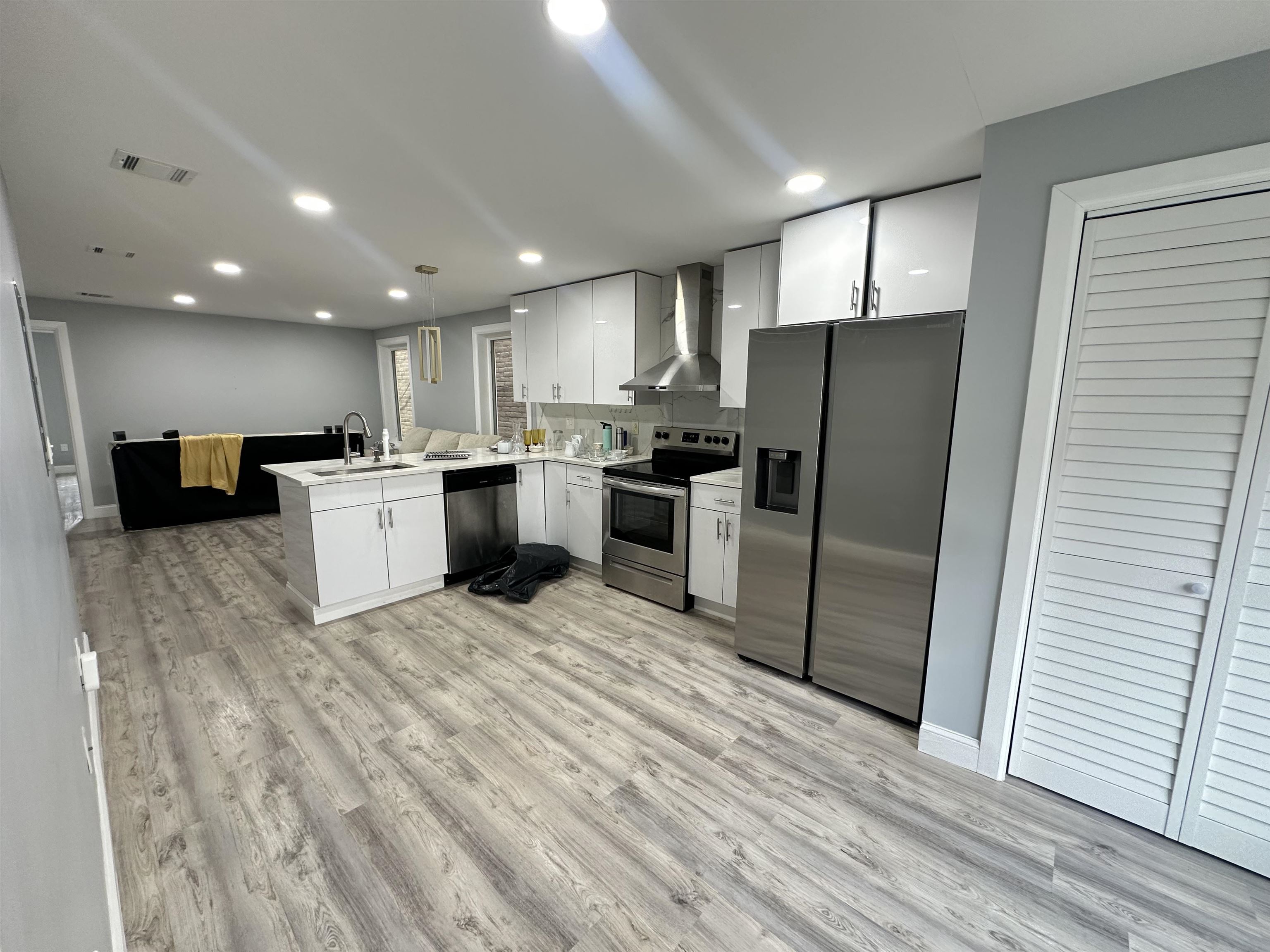 514 43rd Street, Unit 2 Union City, NJ 07087 - Photo 10 of 14 a kitchen with refrigerator and microwave