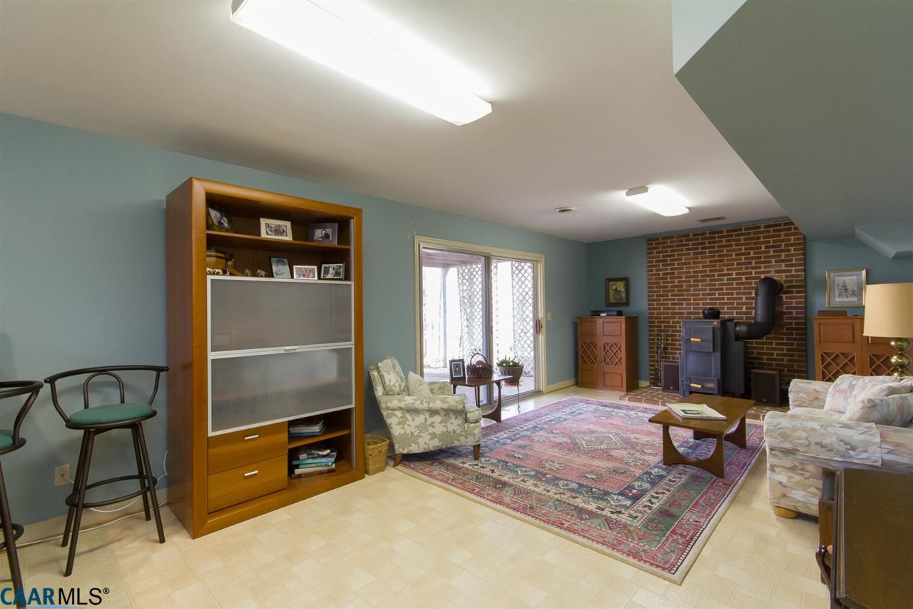 45 Out Of Bounds Road Palmyra, VA 22963 - Photo 30 of 48 Family Room in Fin. Basement w/Woodstove Fireplace & Wet Bar - You Will Never Be Without Heat In This Home!