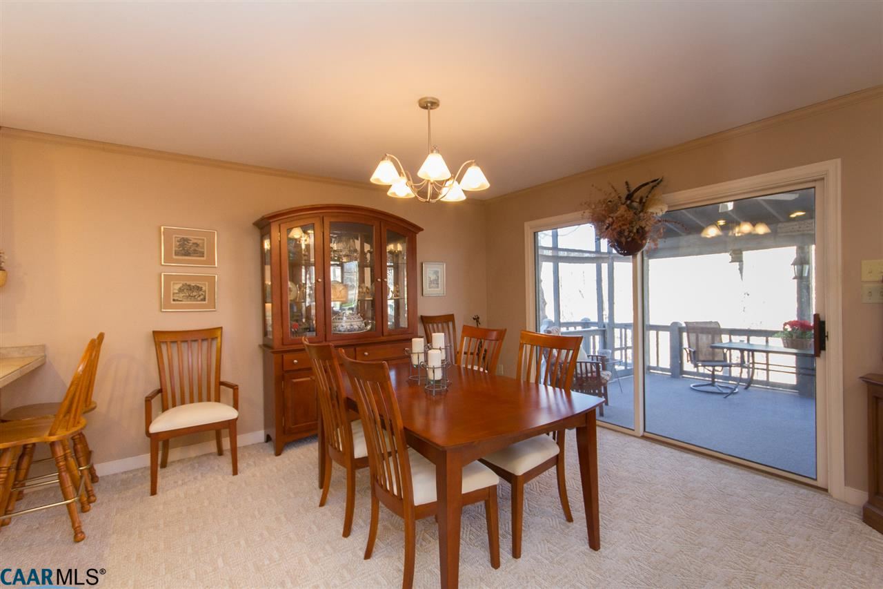 45 Out Of Bounds Road Palmyra, VA 22963 - Photo 10 of 48 Dining Area with Walk-out to Screened Porch