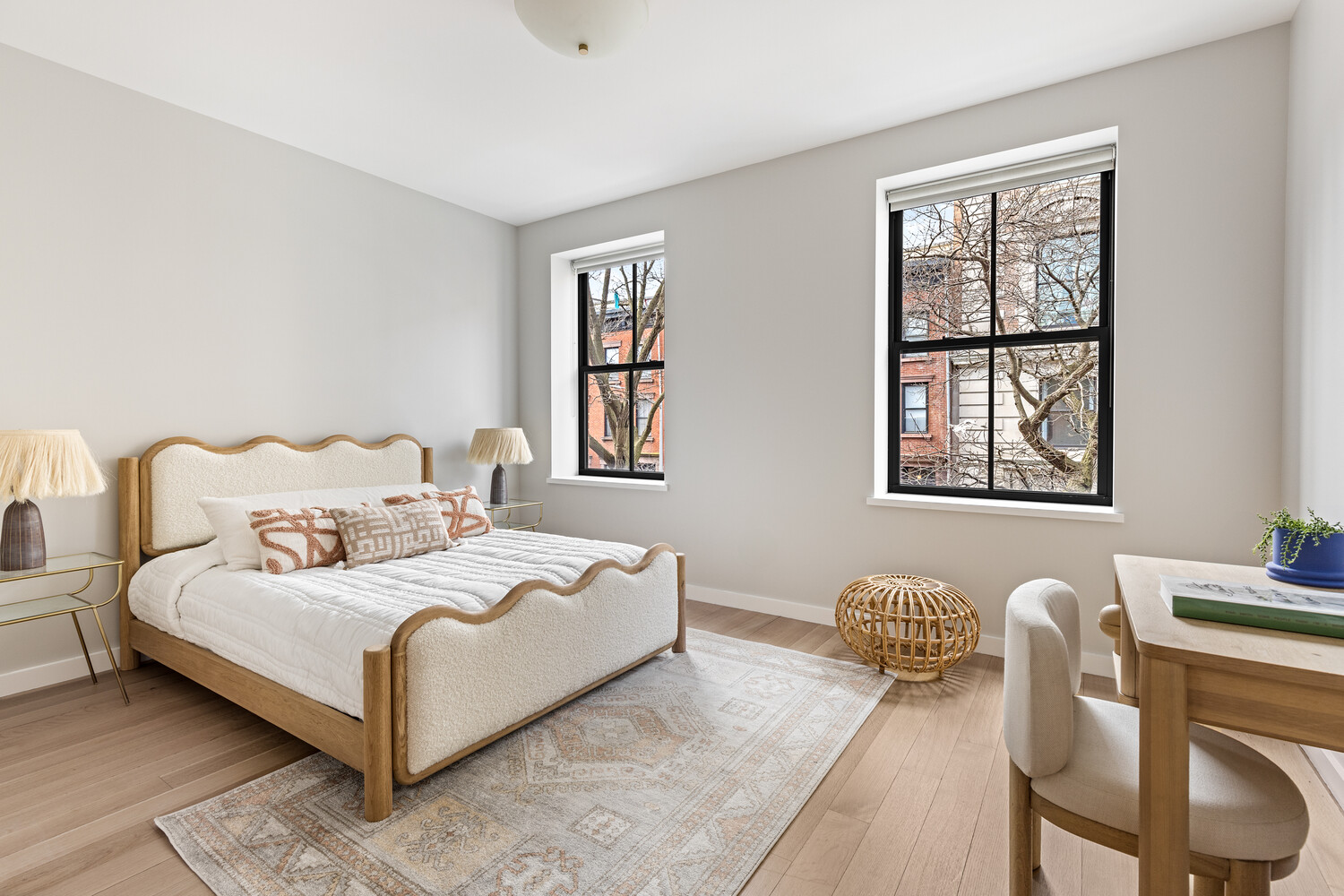 357 Henry Street Brooklyn, NY 11201 - Photo 5 of 9 a bedroom with a bed and wooden floor