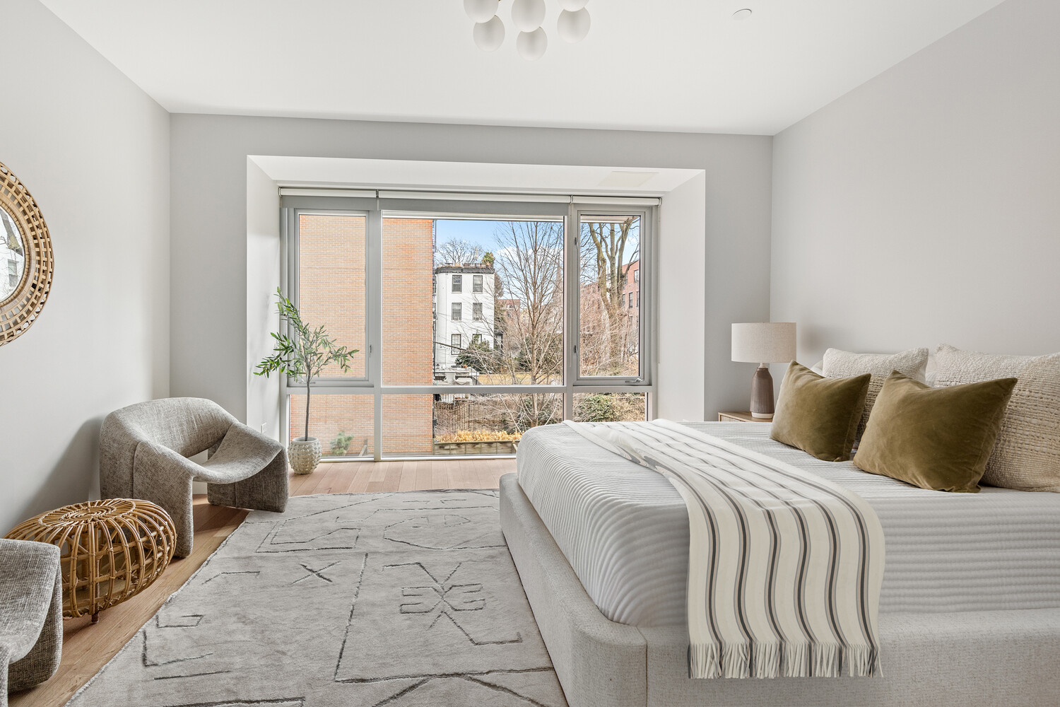 357 Henry Street Brooklyn, NY 11201 - Photo 6 of 9 a bedroom with a bed and a couch