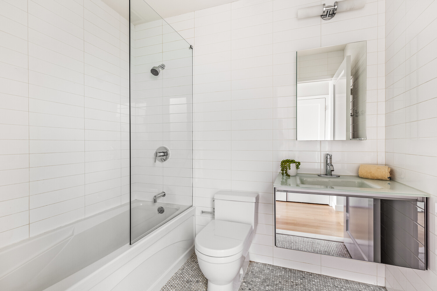 357 Henry Street Brooklyn, NY 11201 - Photo 9 of 9 a bathroom with a granite countertop sink toilet and shower