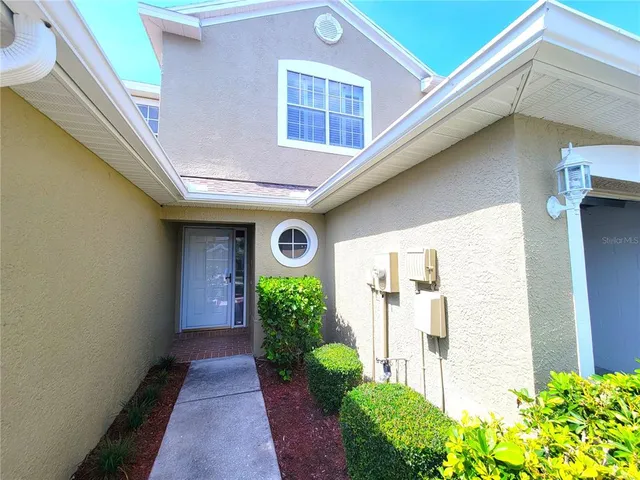 a view of a back yard of the house