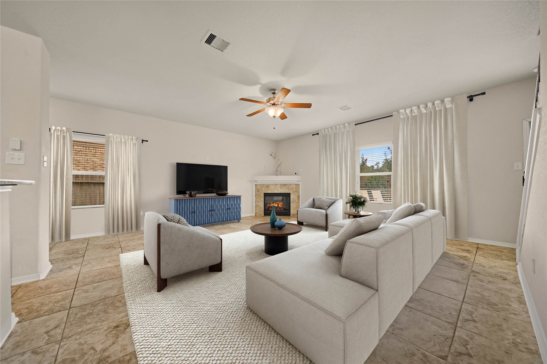 2672 Magnolia Fair Way Spring, TX 77386 - Photo 5 of 49 Step inside into the beautiful family room overlooking your private backyard. A corner gaslog fireplace anchors the space.
