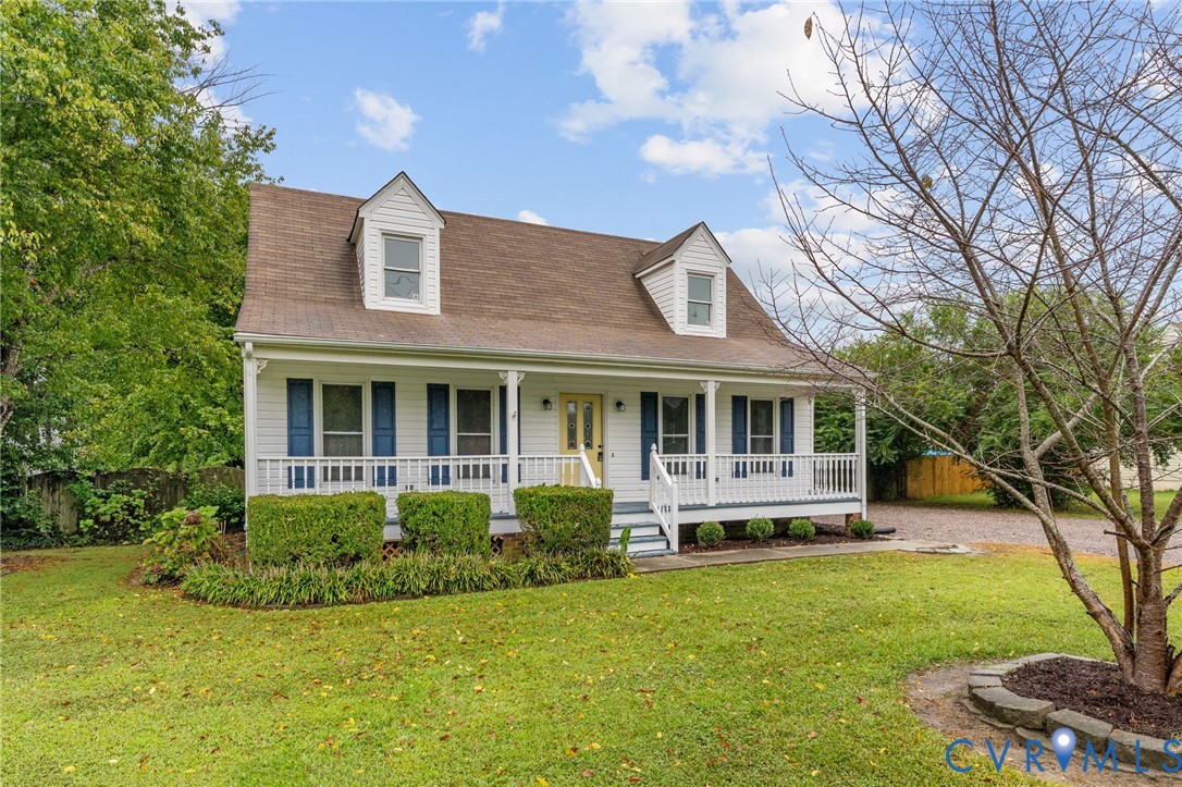 11345 Walton Lake Road Disputanta, VA 23842 - Photo 2 of 37 a front view of a house with a yard