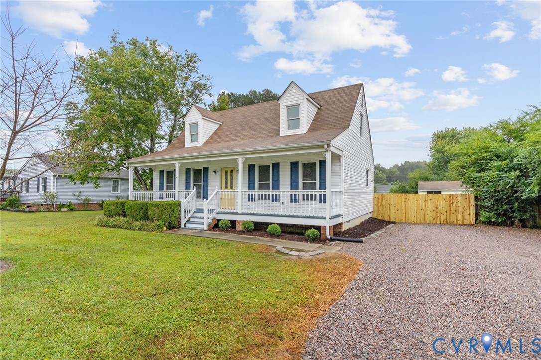 11345 Walton Lake Road Disputanta, VA 23842 - Photo 3 of 37 a view of a house with a yard and sitting area