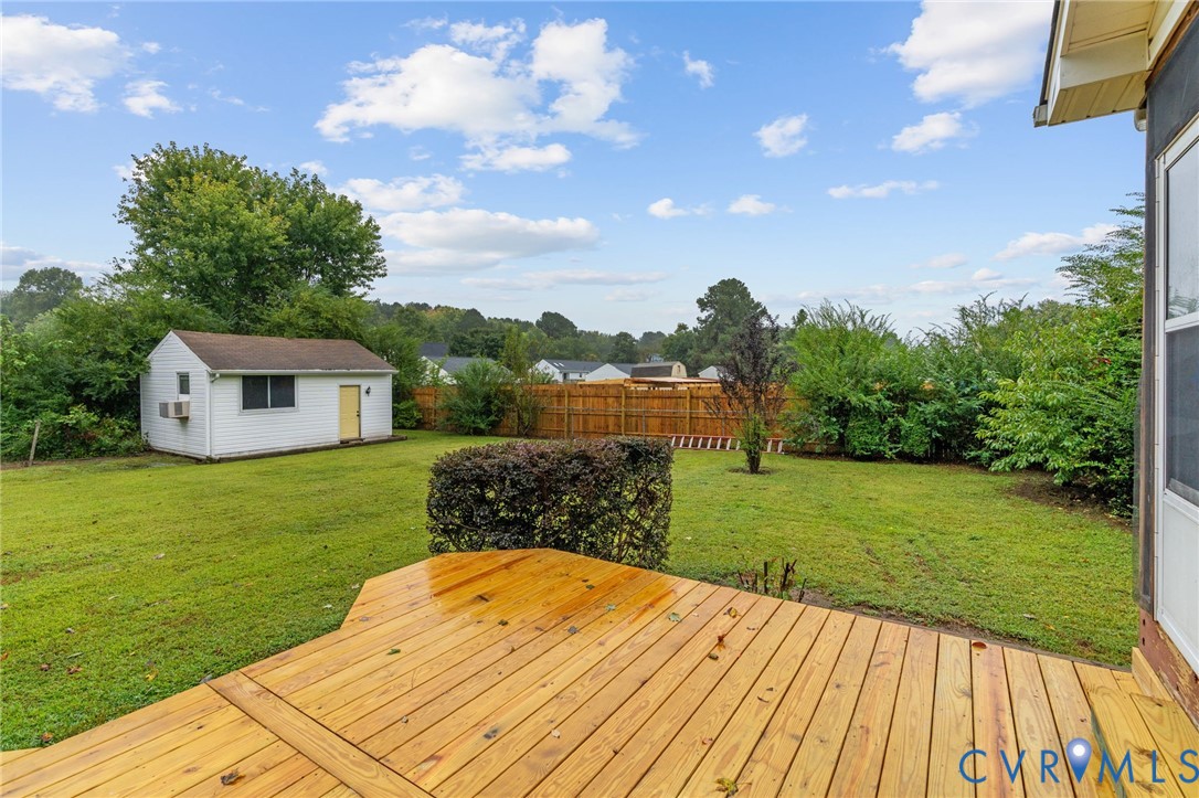 11345 Walton Lake Road Disputanta, VA 23842 - Photo 34 of 37 a view of a backyard with a garden