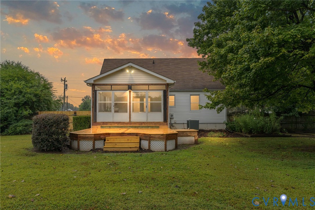 11345 Walton Lake Road Disputanta, VA 23842 - Photo 37 of 37 a front view of house with yard and seating area
