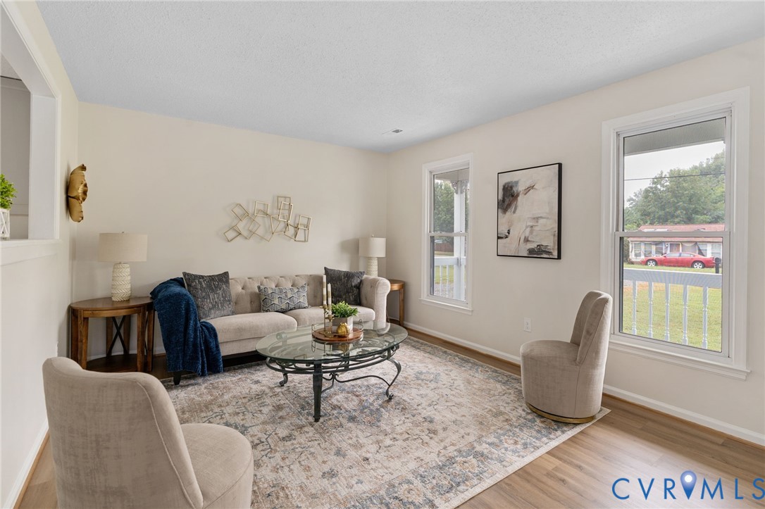 11345 Walton Lake Road Disputanta, VA 23842 - Photo 9 of 37 a living room with furniture and a window