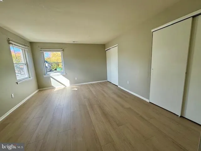 a bathroom with a toilet sink and shower