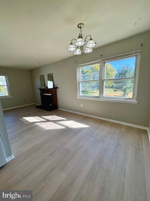 115 Willow Turn Mount Laurel, NJ 08054 - Photo 5 of 13 a view of an empty room with wooden floor and a window