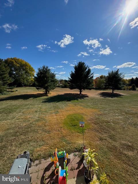 115 Willow Turn Mount Laurel, NJ 08054 - Photo 6 of 13 a view of a lake with a nearby beach