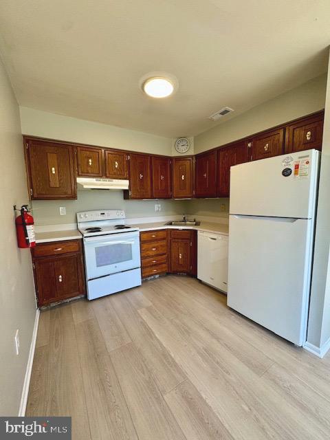 115 Willow Turn Mount Laurel, NJ 08054 - Photo 7 of 13 a kitchen with stainless steel appliances a stove a refrigerator and a more cabinets