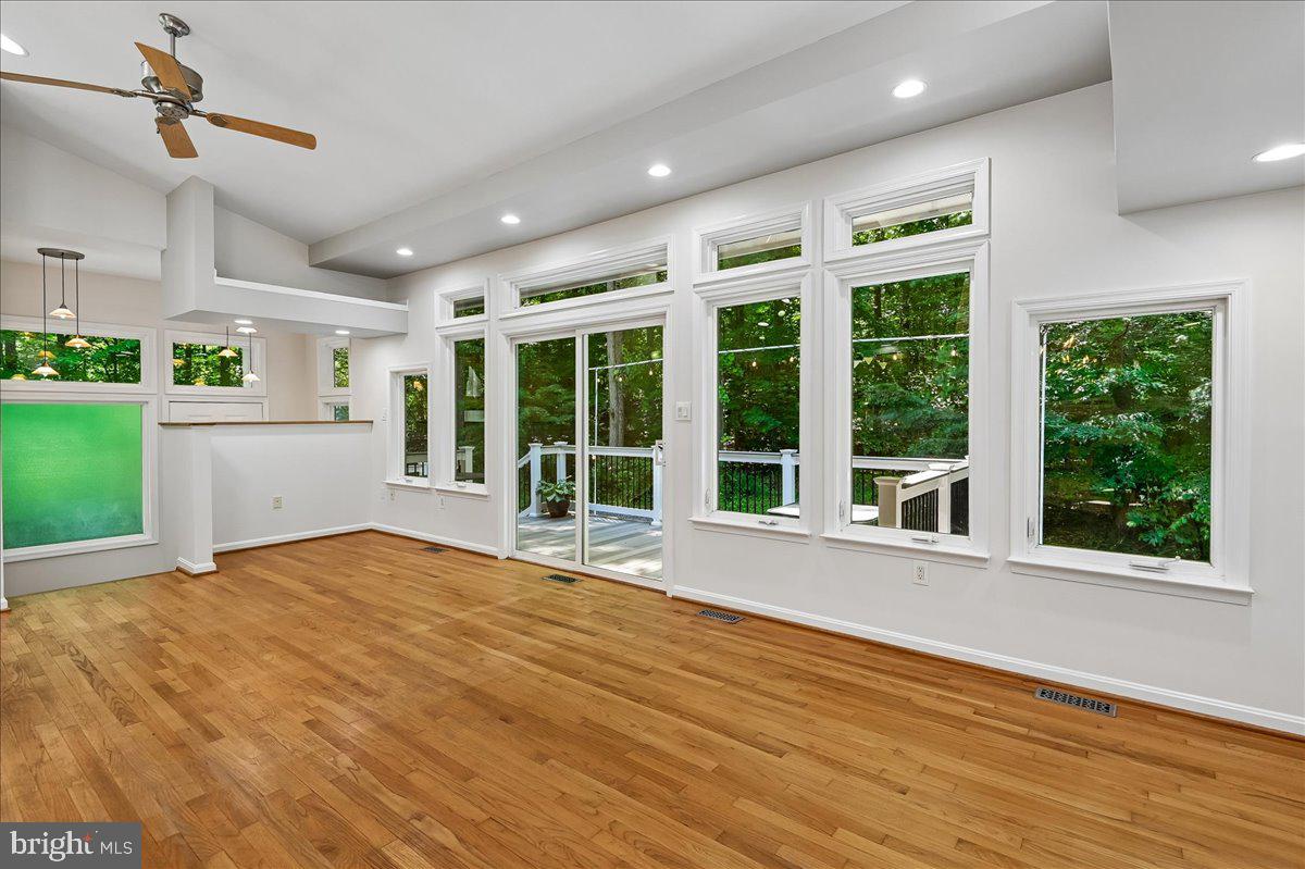 3633 Patuxent River Road Davidsonville, MD 21035 - Photo 19 of 85 Entry & Great Room Wall of Glass & Hardwood Floors