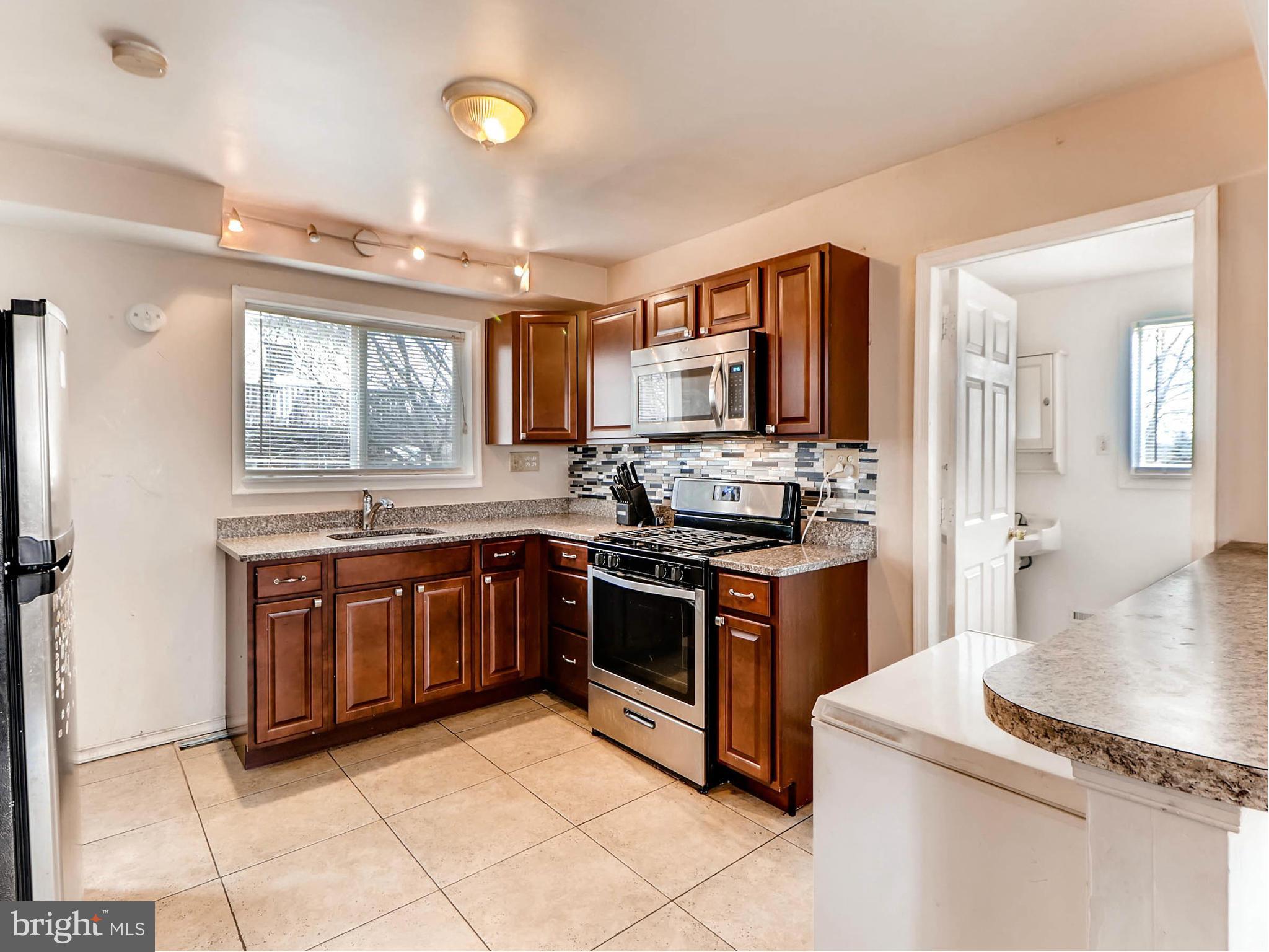7312 Windsor Mill Road Baltimore, MD 21244 - Photo 1 of 26 Kitchen