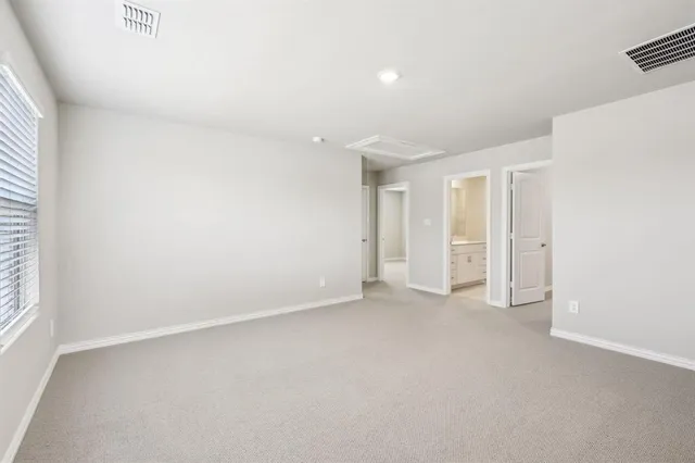 an empty room with a natural light