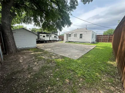 a front view of a house with yard