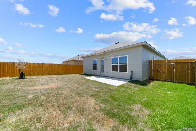 a view of a backyard of house