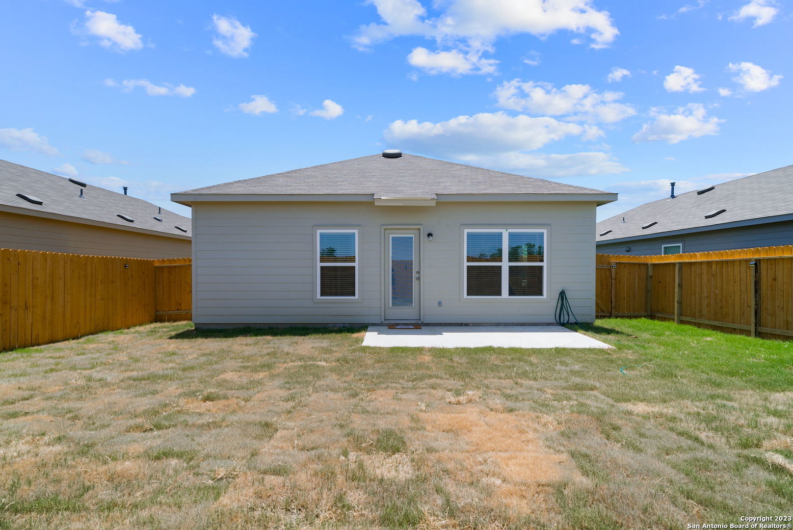 10107 Abrams View Converse, TX 78109 - Photo 23 of 25 a view of a house with a backyard