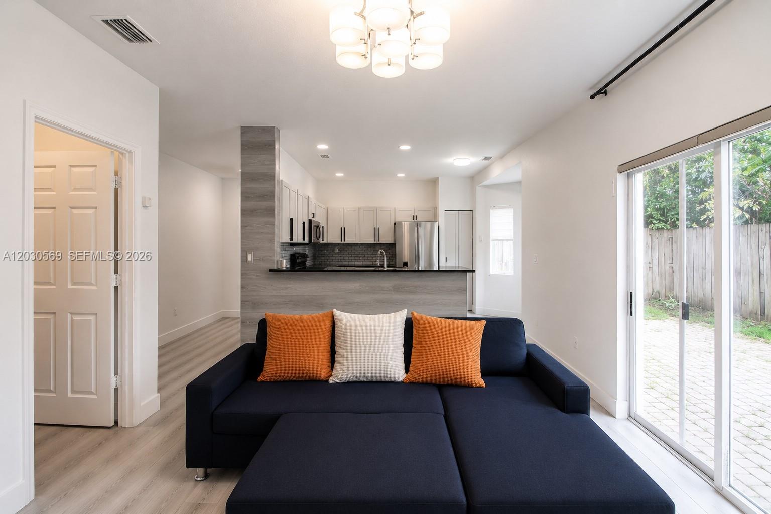 2564 Southwest 147 Path Miami, FL 33185 - Photo 6 of 31 Family room and view to kitchen