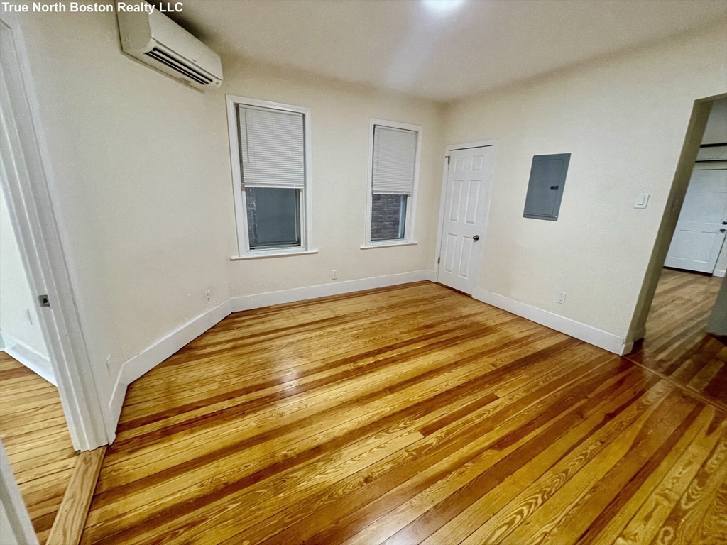 207 Princeton Street, Unit 1 Boston, MA 02128 - Photo 11 of 15 a view of an empty room