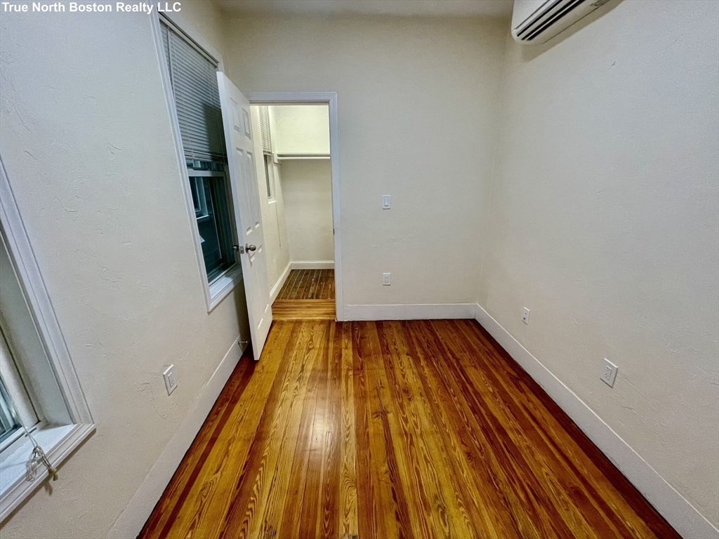 207 Princeton Street, Unit 1 Boston, MA 02128 - Photo 4 of 15 a view of wooden floor