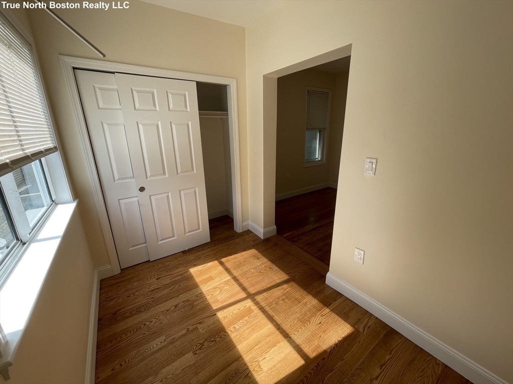 207 Princeton Street, Unit 1 Boston, MA 02128 - Photo 6 of 15 a view of front door