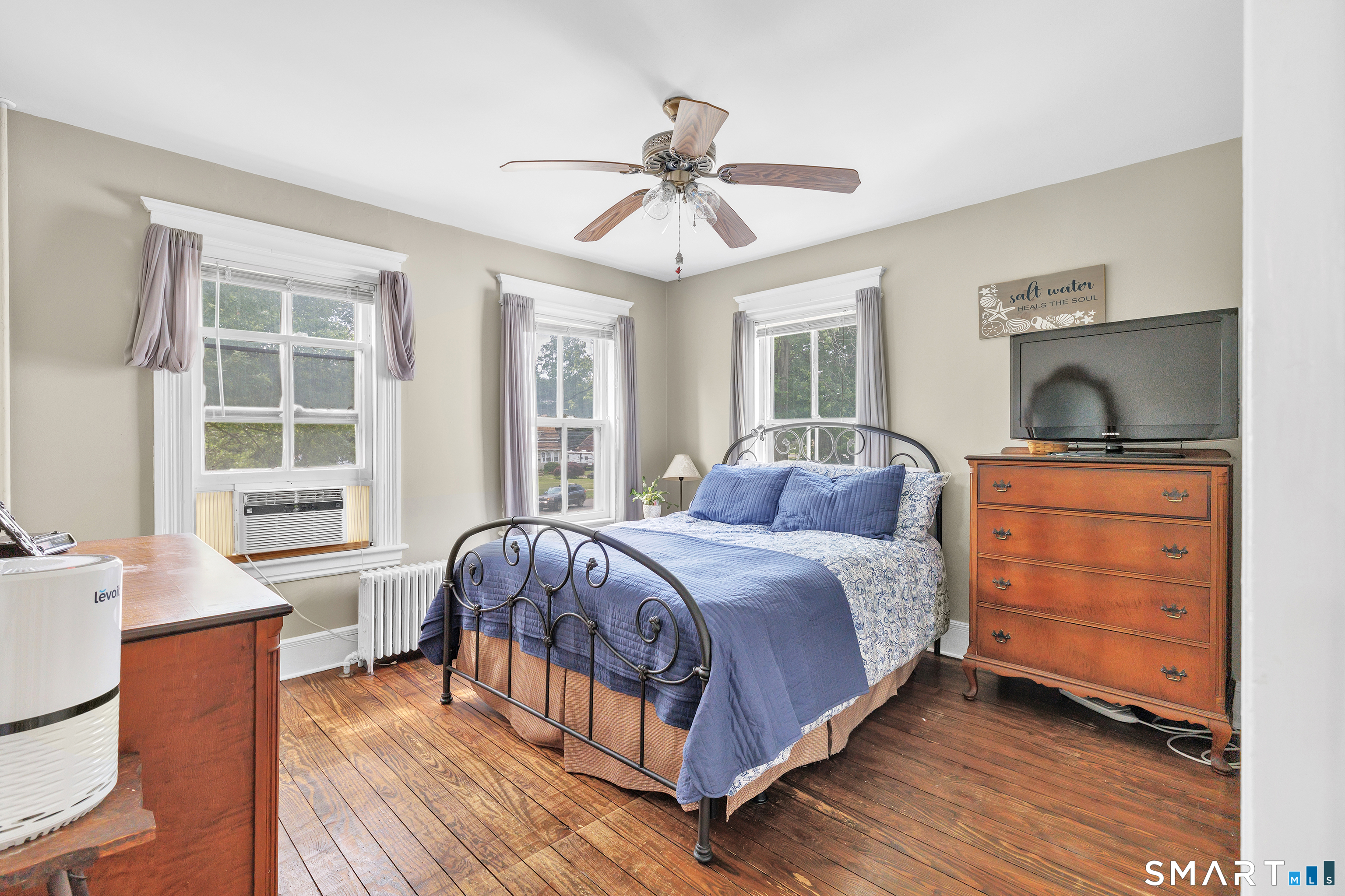 1326 Huntington Road Stratford, CT 06614 - Photo 21 of 37 Upstairs - Primary Bedroom with Hardwood Floors and Walk in Closet