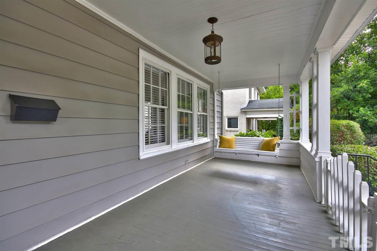2302 Fairview Road Raleigh, NC 27608 - Photo 3 of 25 a view of front door and porch with seating space