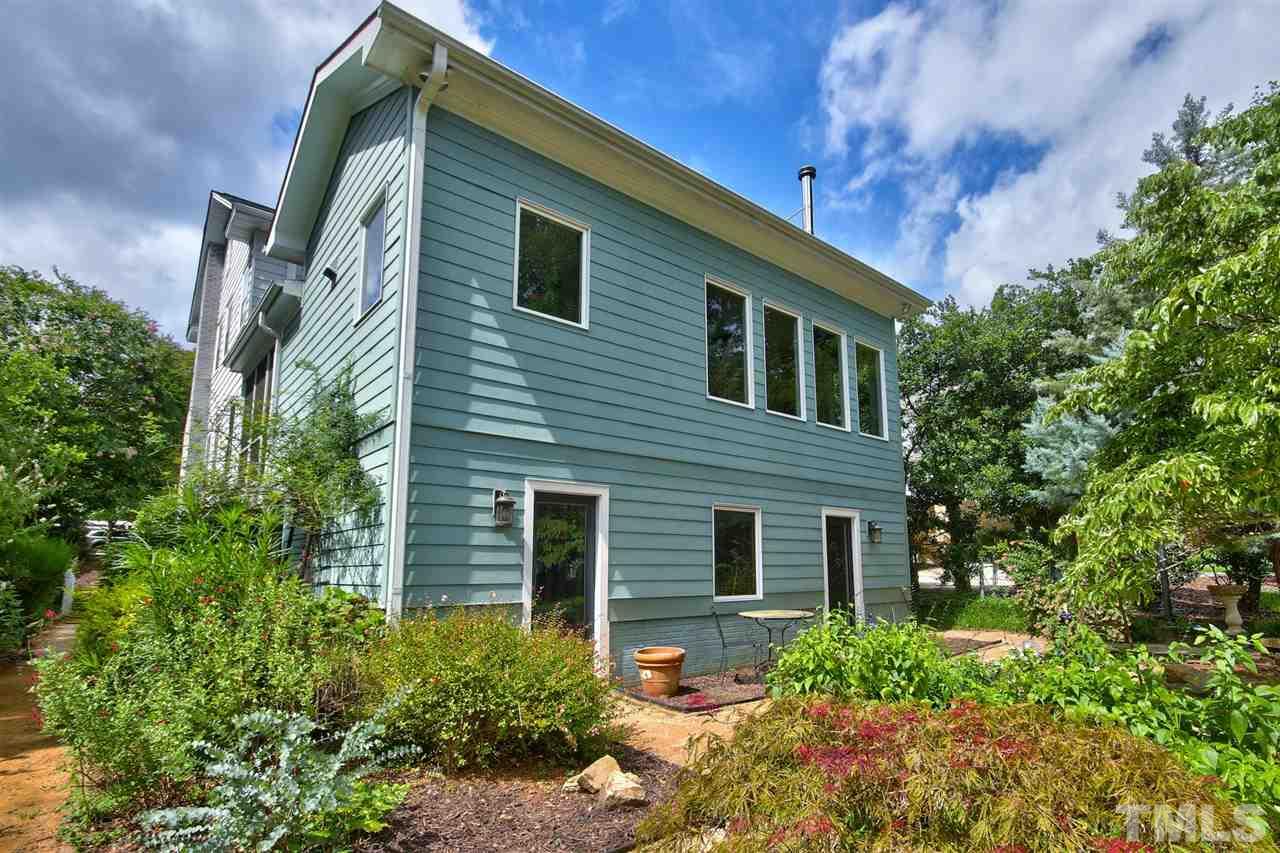 2302 Fairview Road Raleigh, NC 27608 - Photo 21 of 25 a front view of a house with plants