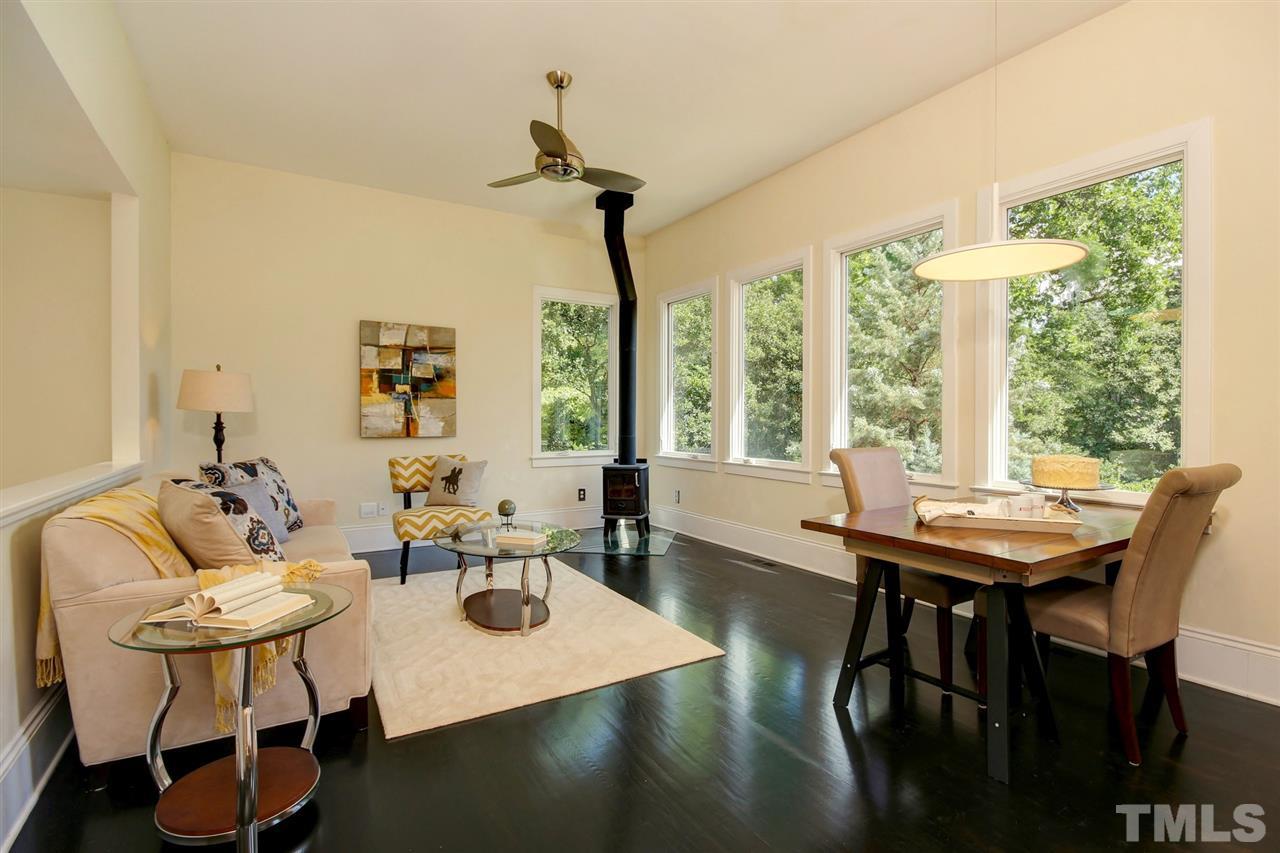 2302 Fairview Road Raleigh, NC 27608 - Photo 10 of 25 a view of a dining room with furniture window and outside view