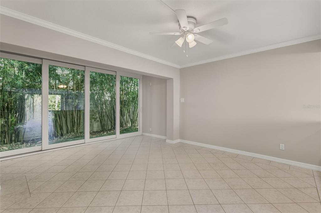 5055 North Beach Road, Unit 106 Englewood, FL 34223 - Photo 11 of 34 a view of an empty room with a window