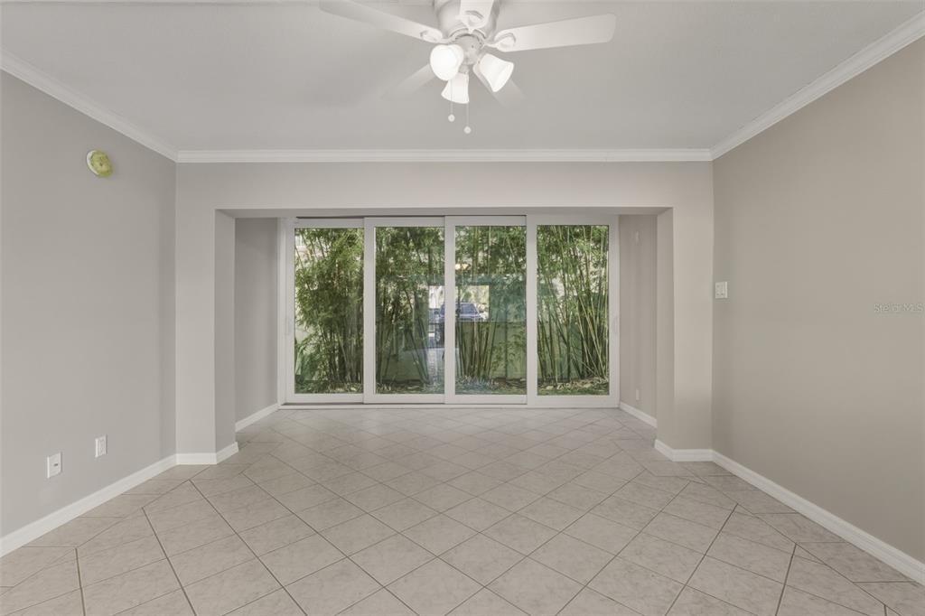 5055 North Beach Road, Unit 106 Englewood, FL 34223 - Photo 12 of 34 a view of an empty room with a window