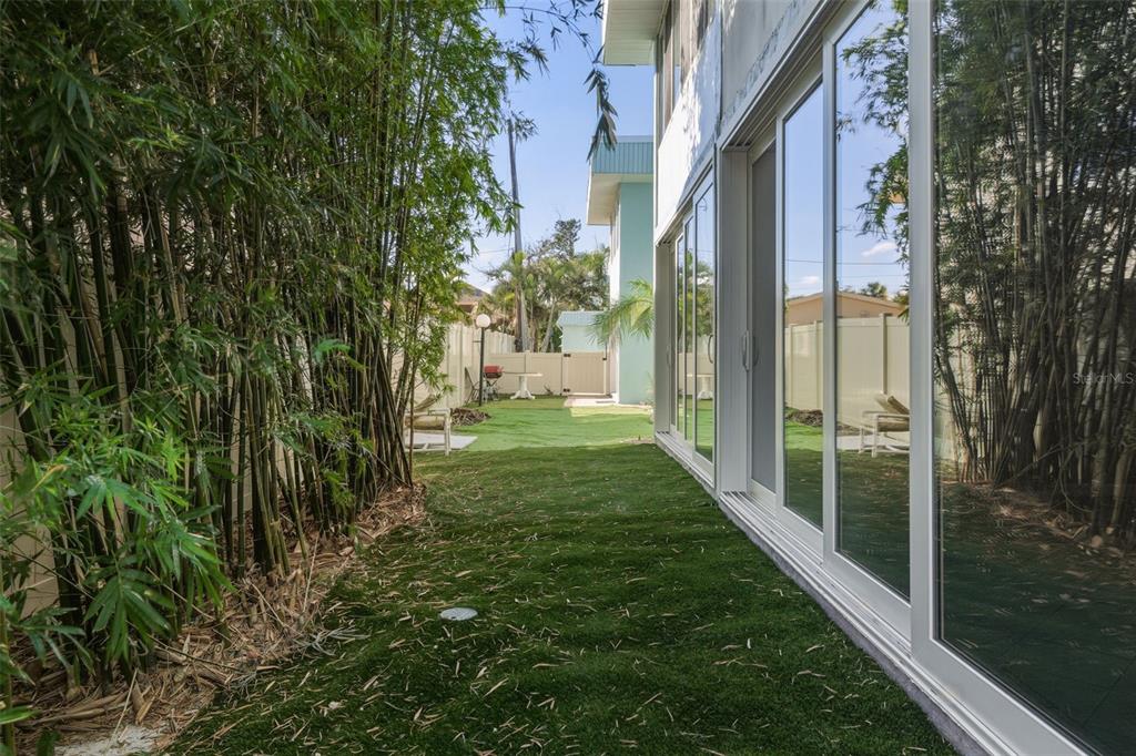 5055 North Beach Road, Unit 106 Englewood, FL 34223 - Photo 24 of 34 a view of a back yard from a balcony