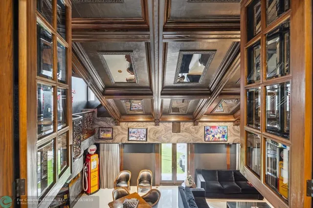 a view of a building with car parked