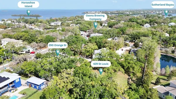a view of a chairs and table in a yard