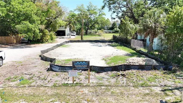 a view of a lake with a house