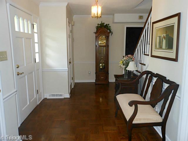 1170 Sweetbriar Road High Point, NC 27262 - Photo 2 of 16 Entry. An inviting entry with warm, wood parquet flooring greets your guests! There are 2 handy coat closets.